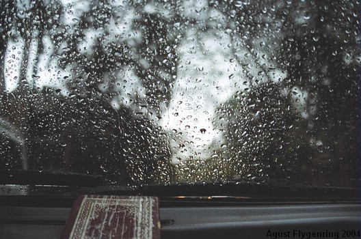 In a taxi in the rain