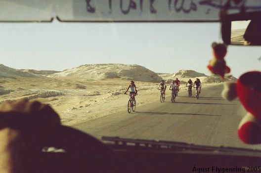 Crazy cyclists cycling through the Desert