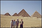 The whole family poses with the Pyramids