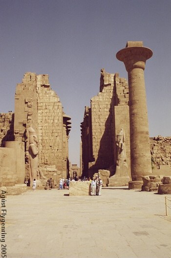 My family dwarfed by the ruins in Luxor
