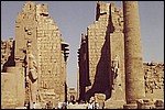 My family dwarfed by the ruins in Luxor