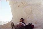 Simo chills under a graffiti ridden rock in the White Desert